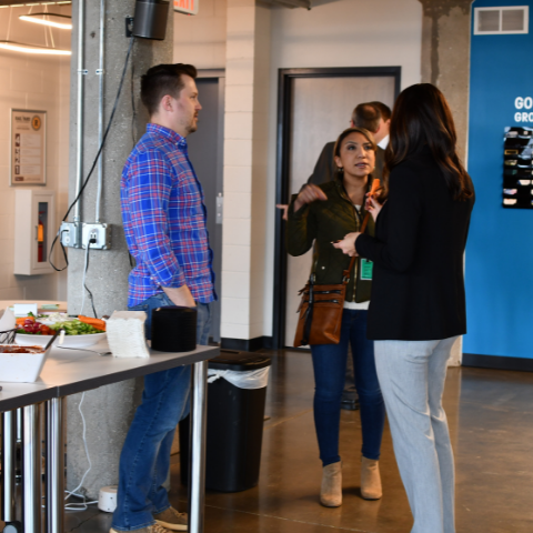 people networking at an event at the Urban Hub
