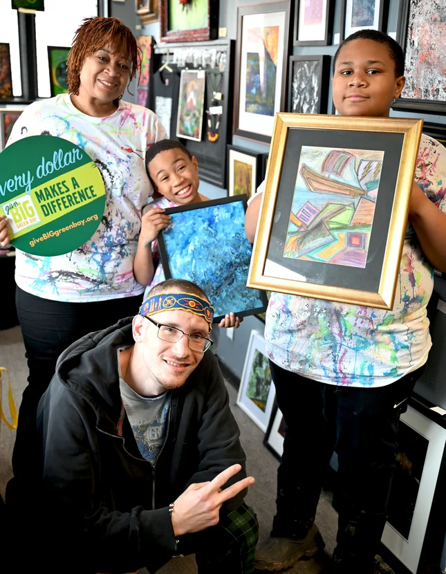Latosha Greenleaf with customers