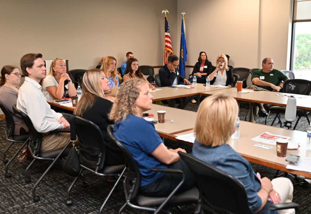 board of members listening to the speaker